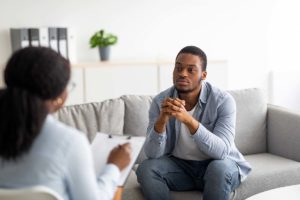 a man benefits on his recovery journey from using cbt for addiction treatment